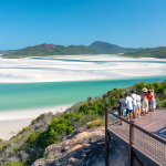 a group of backpackers overlooking a river delta at hill inlet in the Whitsundays