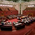 Inside the Australian Parliament House, politicians debate policies—a must-visit highlight on a Canberra day trip from Sydney.