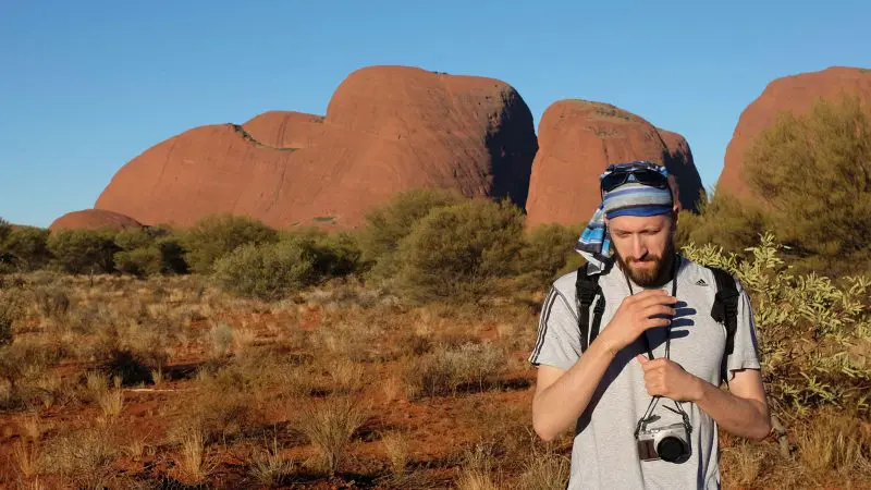 A photographer documents the 3 Day Uluru Rock The Centre Tour from Yulara to Alice Springs in the Australian desert landscape.