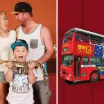 Surprised family with a snake beside a red Big Bus tour, featuring Crocosaurus Cove branding and Croc Explorer Ticket flags visible.