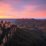 Discover breathtaking rock formations and lush forested hills on a premium 1-Day Blue Mountains Wilderness Tour with sunrise views.