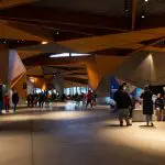 Visitors assemble in a sleek, modern venue before embarking on the 1 Day Phillip Island Penguin Parade Koalas Plus Viewing experience.