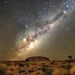 Breathtaking Milky Way over Uluru at night during a 4-day Uluru, Kata Tjuta, and Kings Canyon tour from Yulara to Alice Springs.