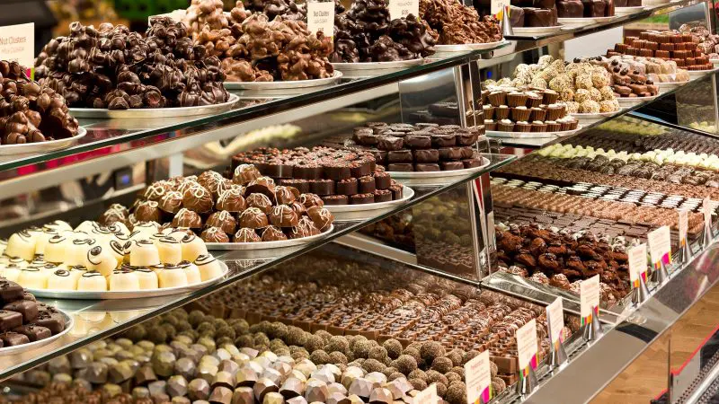 Showcase of premium assorted chocolates, a tempting highlight on your Lake Mountain Snow Waterfalls Tour from Melbourne.