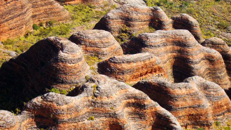 Discover stunning beehive-shaped rocks with striking orange and grey stripes on the Darwin to Perth Adventure, incl Broome stays.