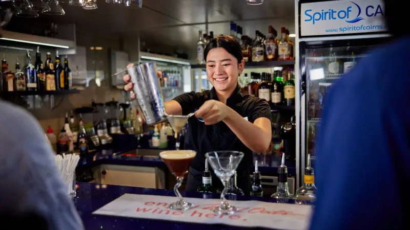 Staff making espresso martini cocktails on the spirit of cairns