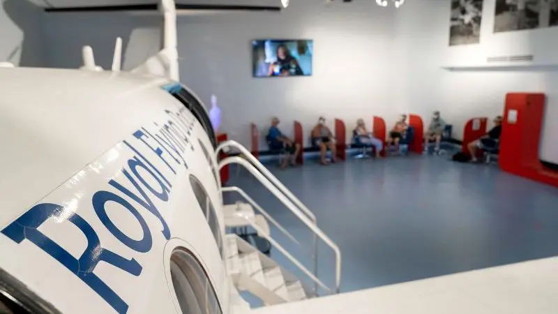 Discover the RFDS Darwin Aviation Attraction: visitors with combined tickets view an historic Royal Flying Doctor Service aeroplane and video exhibition.