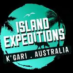 Island Expeditions Kgari Australia logo with dingo, palm tree, and bird on teal; Fraser Island 4WD tours departing from Noosa.