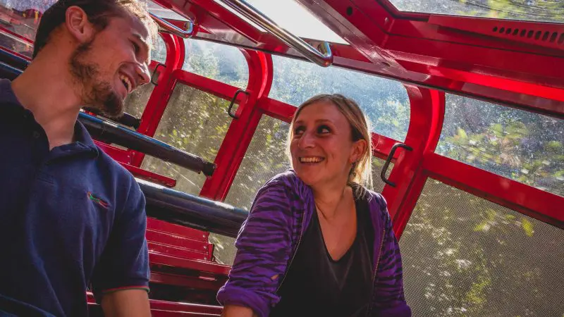 Experience unforgettable moments as two friends laugh joyfully on a sunlit Kookaburra Pass ride, plus Scenic World Food Voucher.