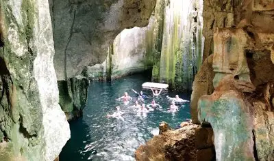 People swimming in Sawa I Lau Caves in Fiji
