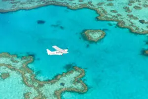 Picture of a scenic flight flying over the heart reef in the Whitsundays tropical islands