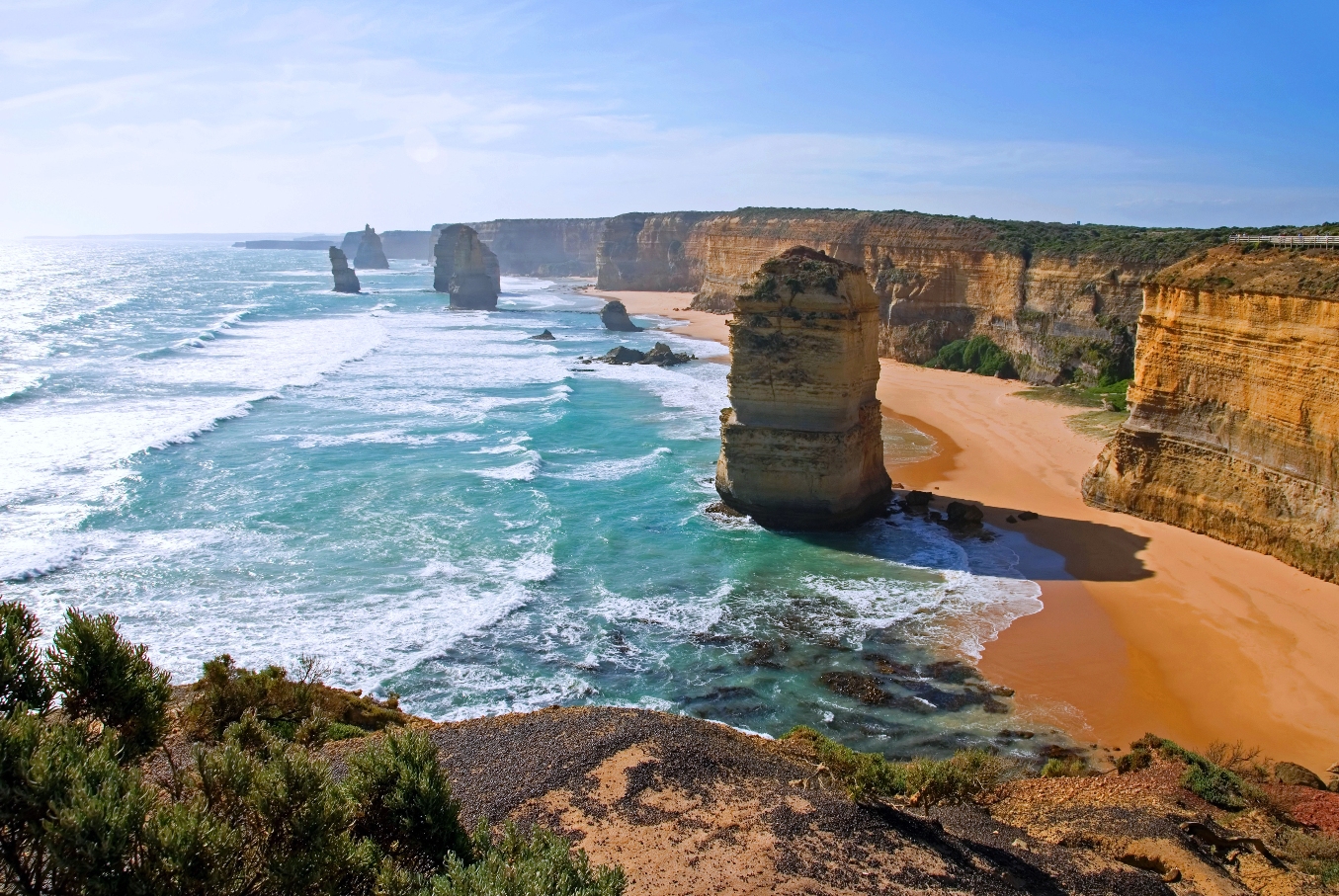 Experience the majestic Twelve Apostles’ towering limestone stacks on a top-rated Great Ocean Road day tour with Go West in Australia.