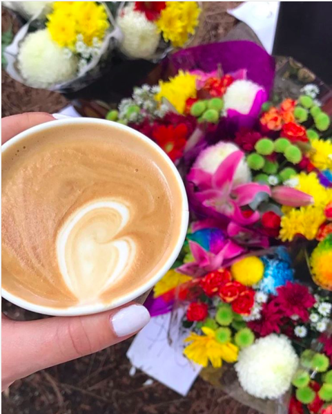 People watch at West End Markets